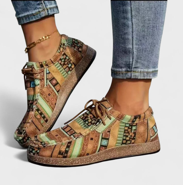 Stylish women's comfort footwear: casual sneakers with extra wide heel for everyday walking and support.