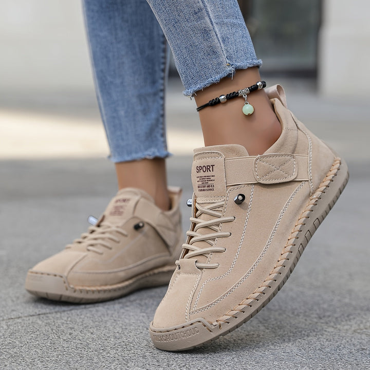 Women's casual stitched lace-up sneakers, comfortable everyday footwear for versatile fashion & daily wear.