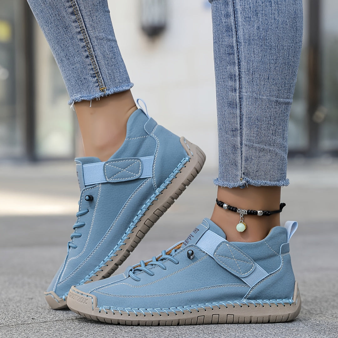 Practical women's stitched lace-up low-top sneakers, offering comfort and style for everyday casual fashion.