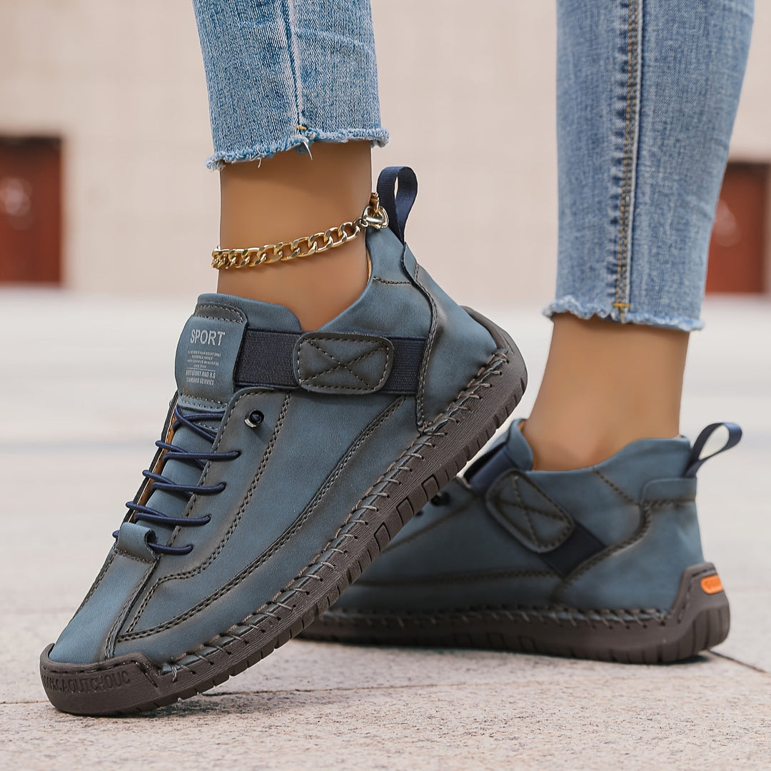 Modern women's casual sneakers with elegant stitching & lace-up design. Comfortable daily wear footwear.