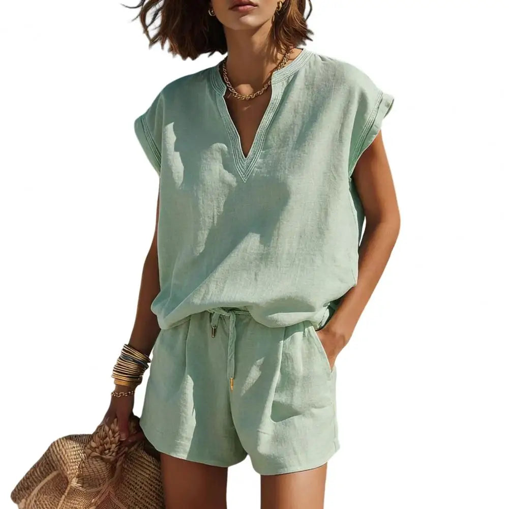 Linen look women's matching shorts set; casual summer outfit with V-neck, cap sleeve top.