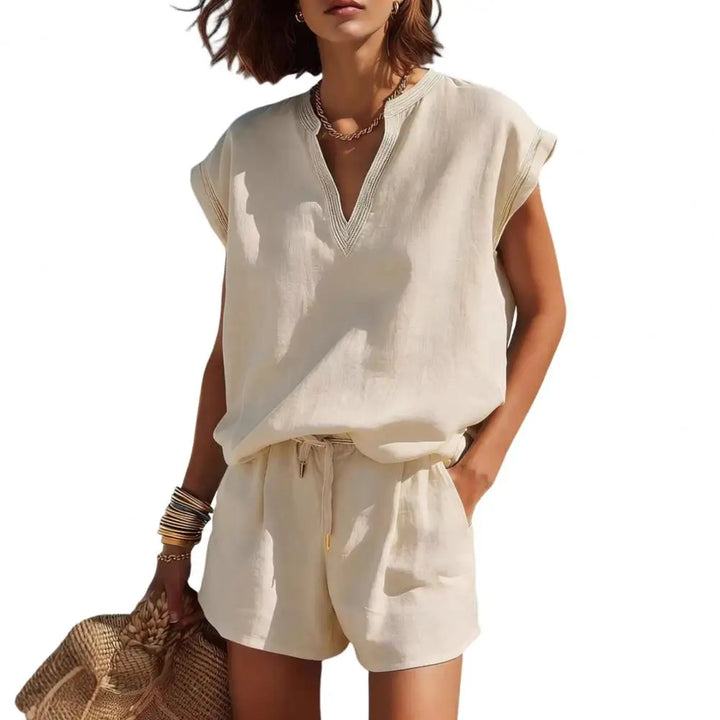 Women's 2-piece summer co-ord set: notch V-neck top & shorts, ideal for casual outings or resort.