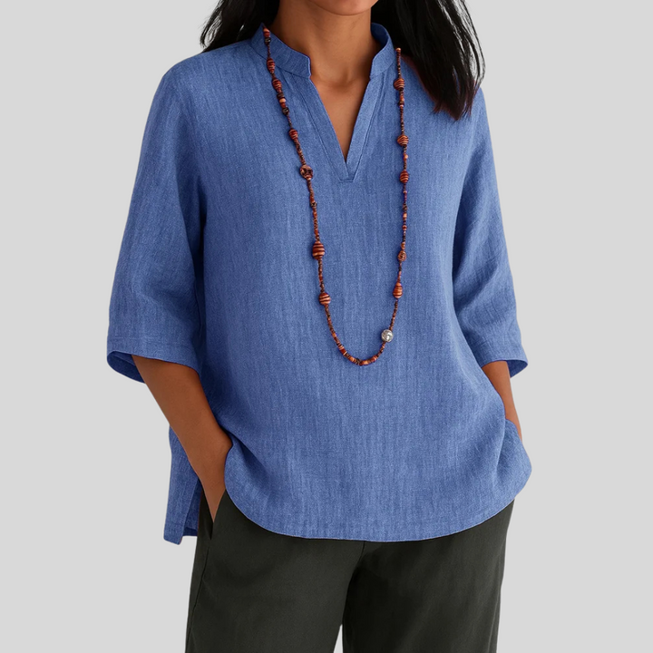 Chic women's V-neck 3/4 sleeve top, relaxed fit blouse for versatile smart casual or spring/summer fashion.