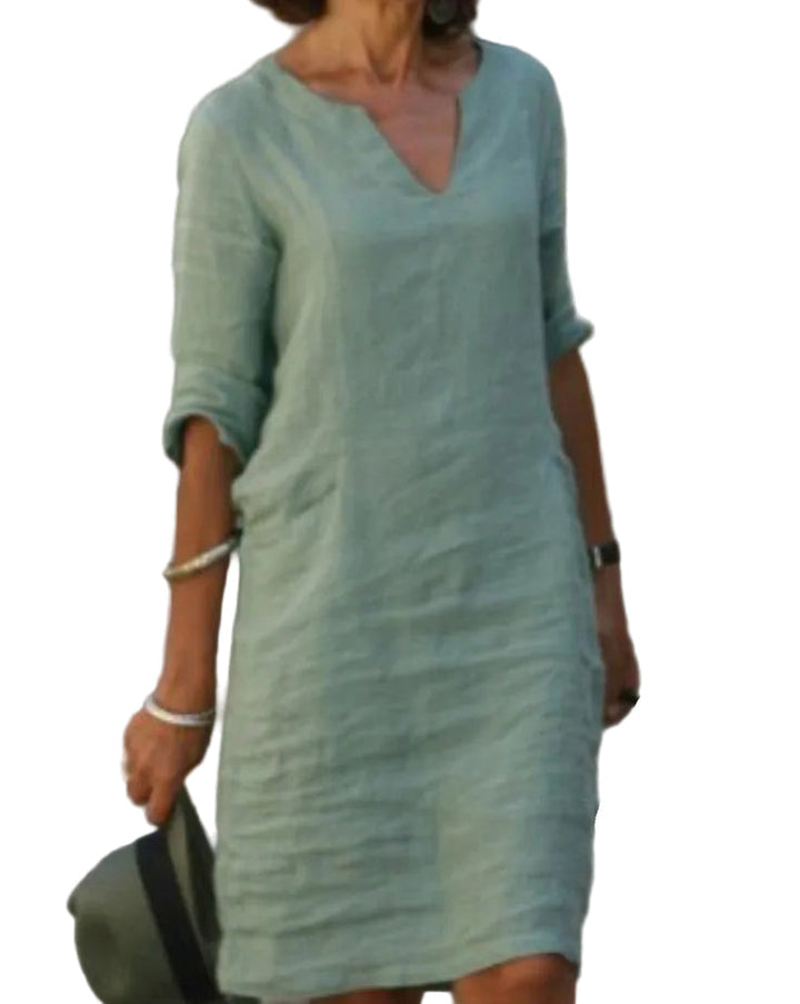 Women's casual V-neck midi dress, perfect for summer. Relaxed fit, comfortable for everyday wear.