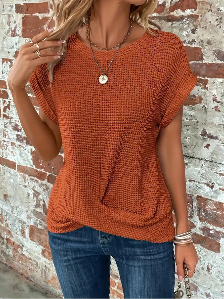 Women's casual waffle knit short sleeve top, soft and textured for comfortable everyday wear.