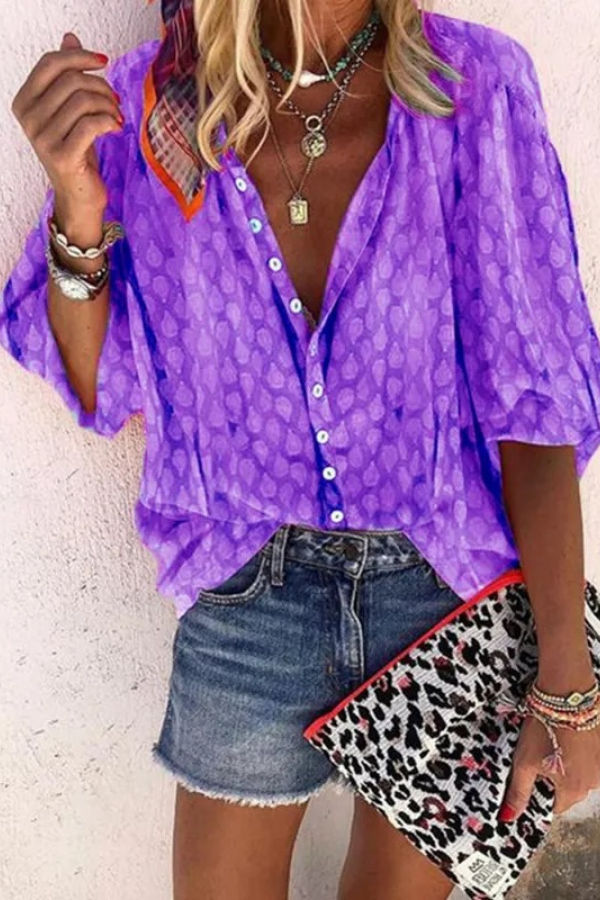 Versatile women's button-front blouse, great for elegant work attire or casual spring/summer fashion.