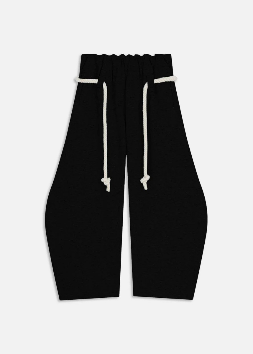 Stylish women's barrel leg sweatpants for casual wear, showcasing a wide leg and modern street style design.