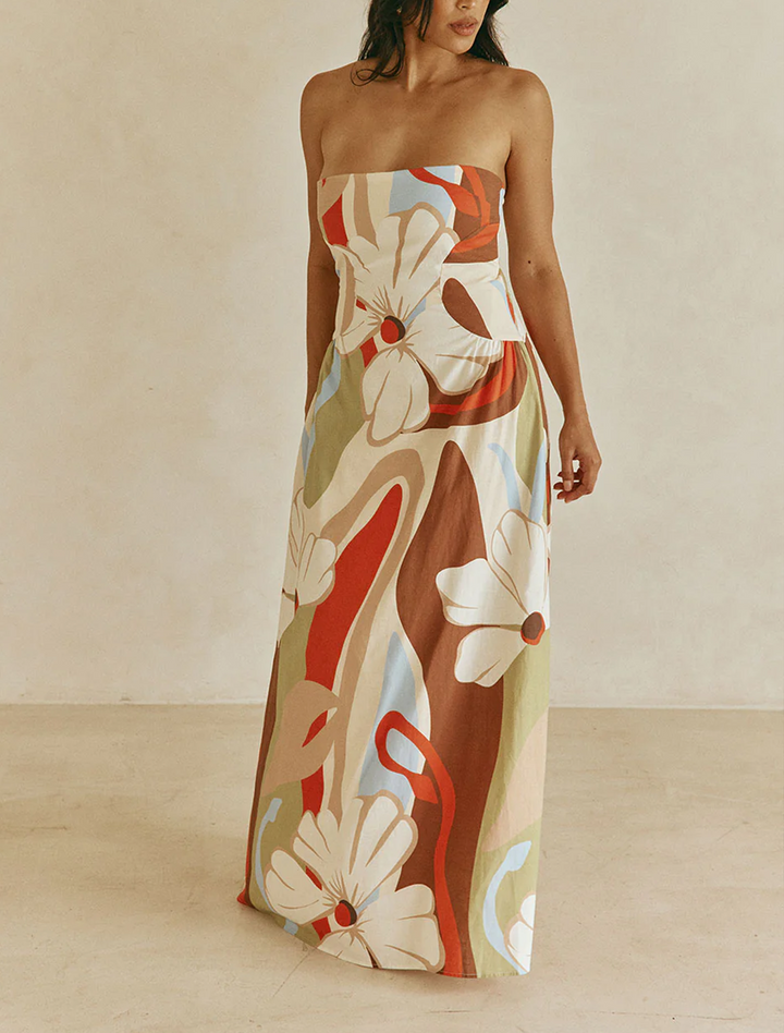 Stylish women's beige floral strapless maxi dress, A-line cut. Ideal for summer fashion, resort wear, and vacation.