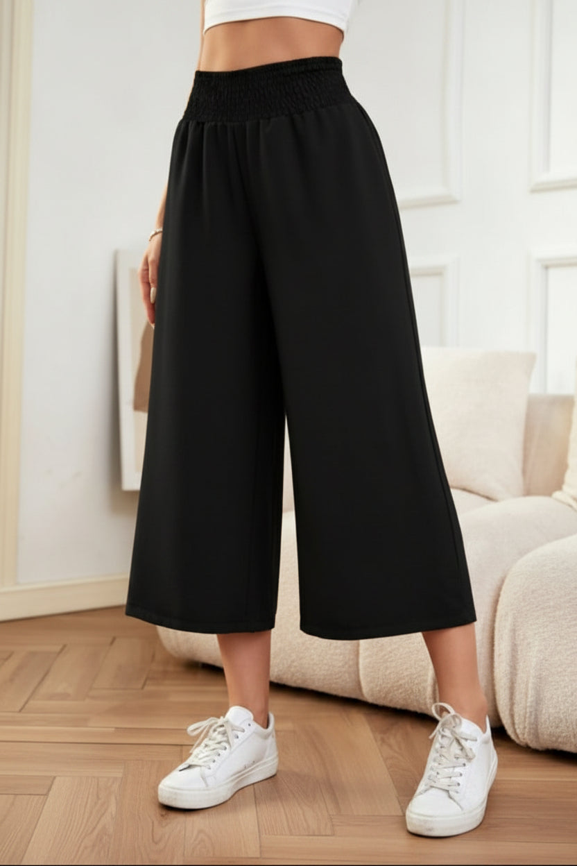 Comfortable women's khaki cropped wide leg pants with elastic waist, ideal for stylish casual or office outfits.