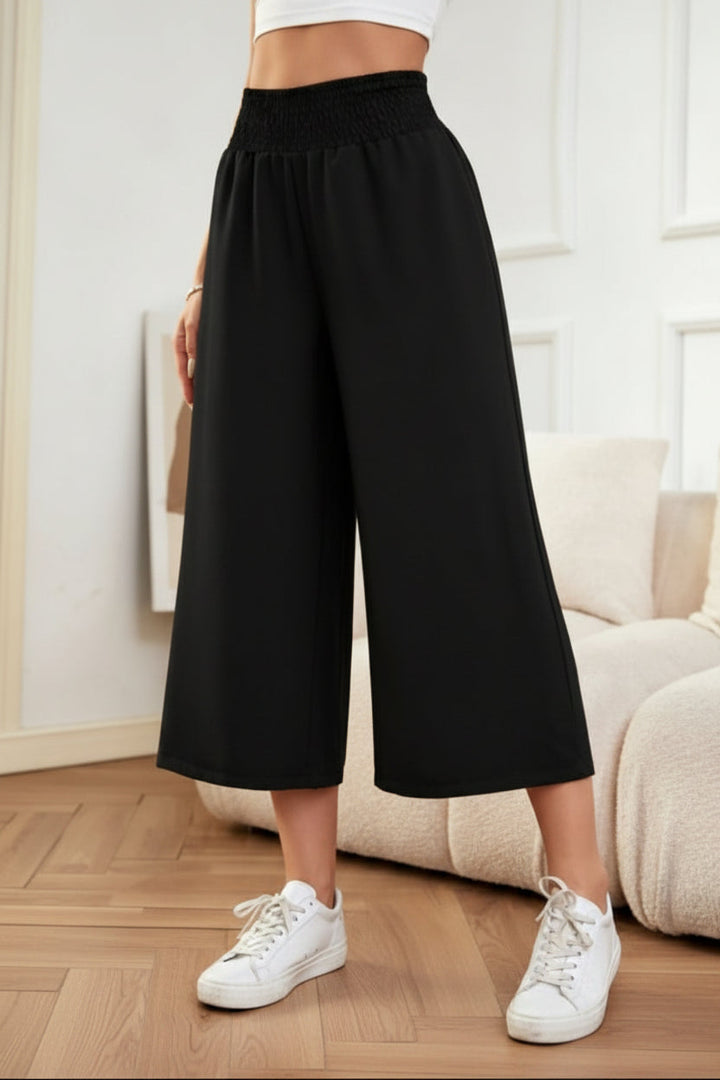Comfortable women's khaki cropped wide leg pants with elastic waist, ideal for stylish casual or office outfits.