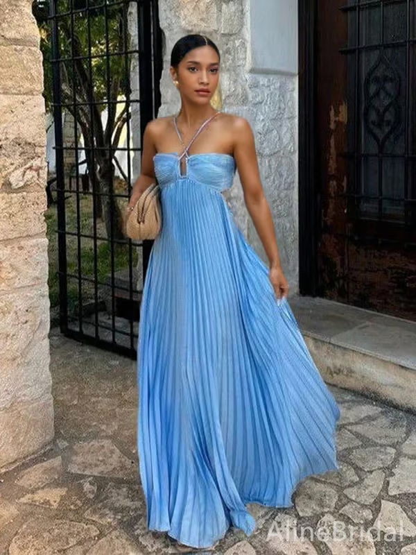Flowing blue pleated maxi dress for women, elegant cutouts, perfect for a chic wedding guest look.