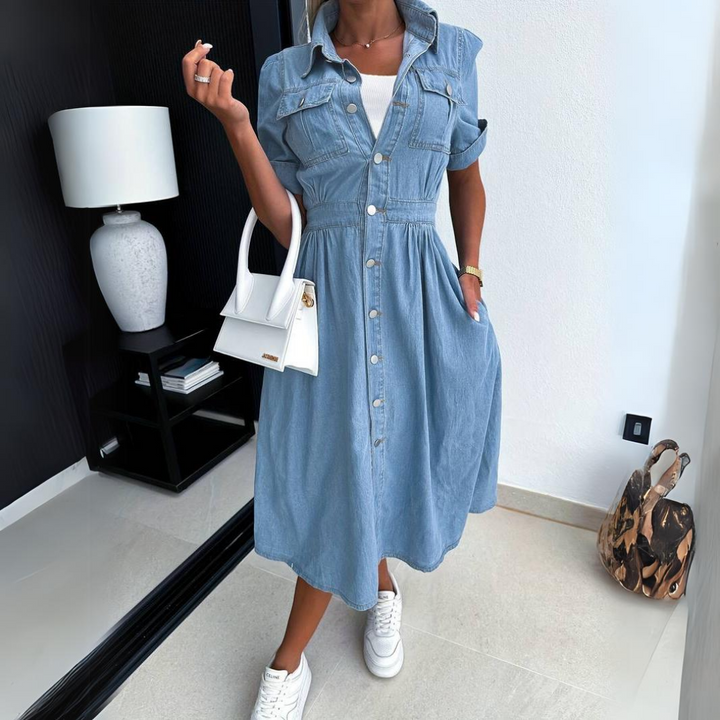 Elegant women's midi dress featuring a button-front and short sleeves. A flattering fit for any occasion.