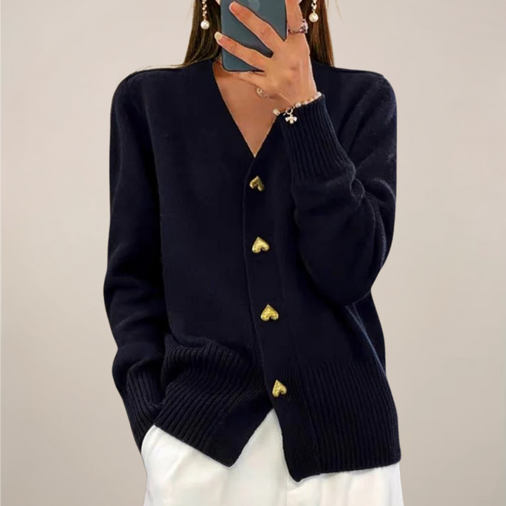 Women's chic cardigan, long sleeve, featuring elegant gold heart buttons. Perfect for layering & fashion.
