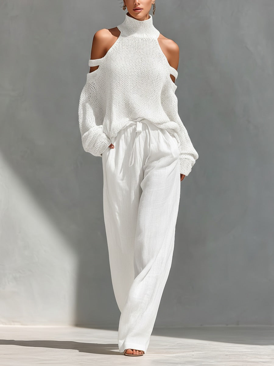 Comfortable women's two-piece set with stylish cold shoulder top & flowy wide leg pants. Ideal for resort or casual wear.