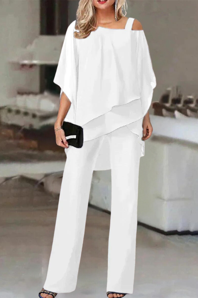 Comfortable women's blouse & pants set. Chic coordinated two-piece outfit for versatile everyday and office wear.
