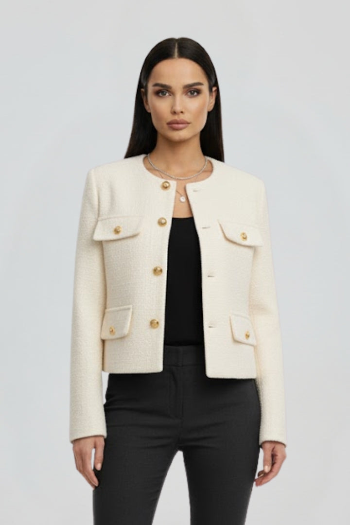 Modern women's cropped jacket with practical pockets & front buttons, ideal for casual outfits.