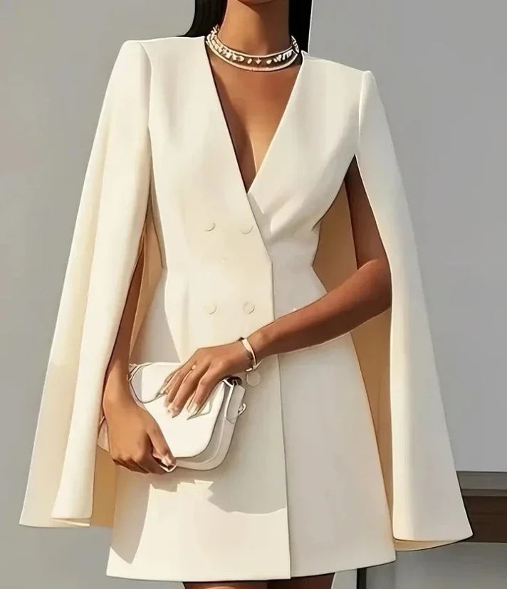 Women's chic double-breasted mini dress with elegant cape sleeves and a flattering V-neck, perfect for cocktails.