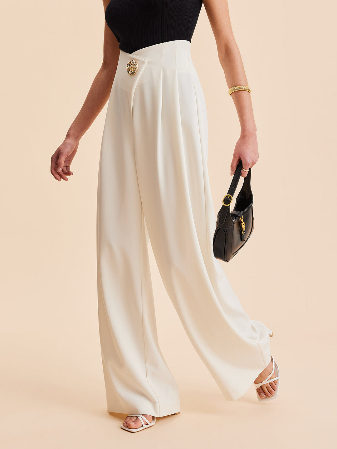 Black high-waist wide-leg pants. Women's chic embellished design with invisible zipper, perfect for any occasion.