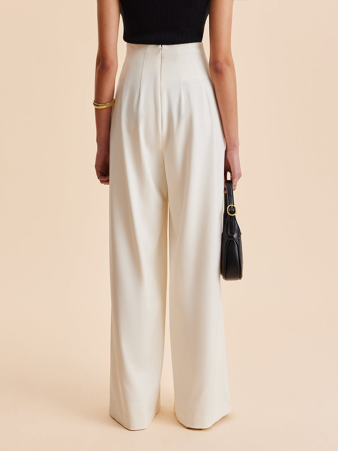 Stylish women's wide-leg pants with high waist. Asymmetrical design, pockets, great for summer & spring outfits.