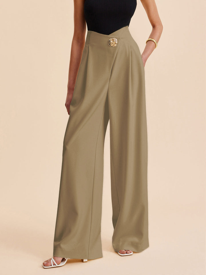 Professional women's high-waist wide-leg pants. Chic workwear bottoms with elegant asymmetrical detailing.
