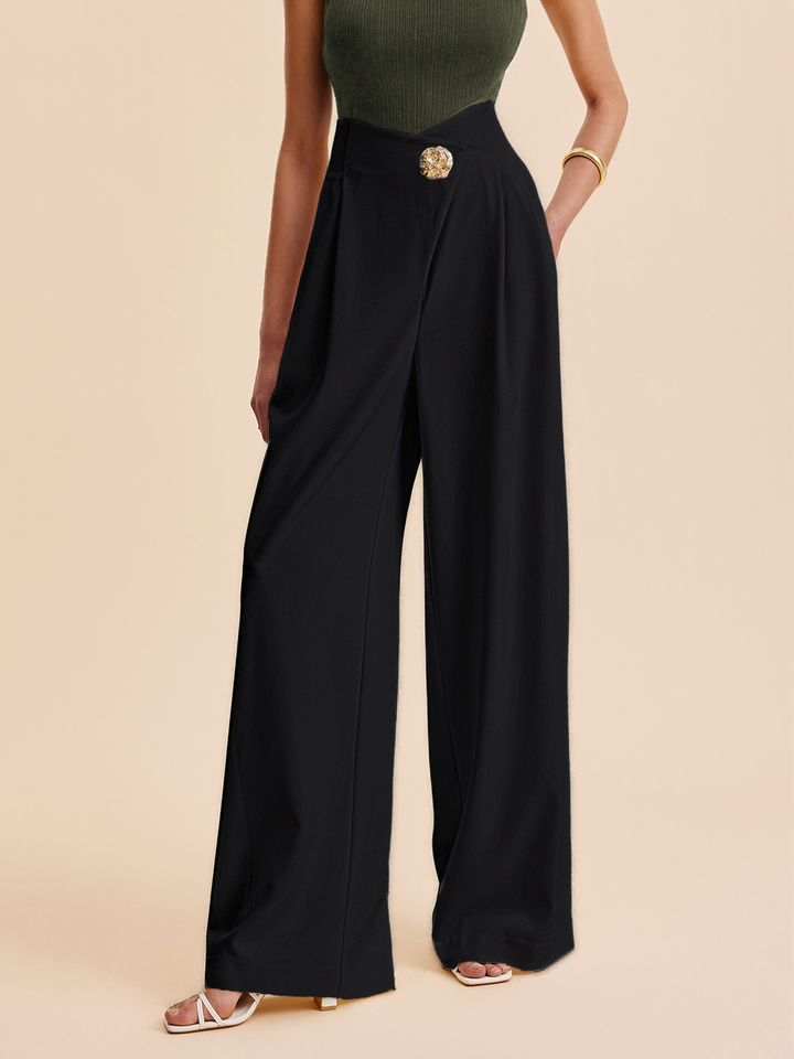 Embellished wide-leg pants for women. High-waist design with unique asymmetrical fashion detail & pockets.