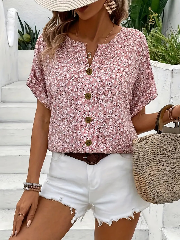 Women's chic floral print blouse, a flowy and elegant top perfect for summer style.