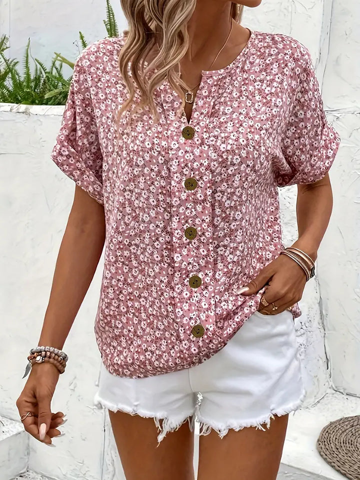 Chic women's button-up floral print blouse, an elegant and flowy top for effortless summer style.