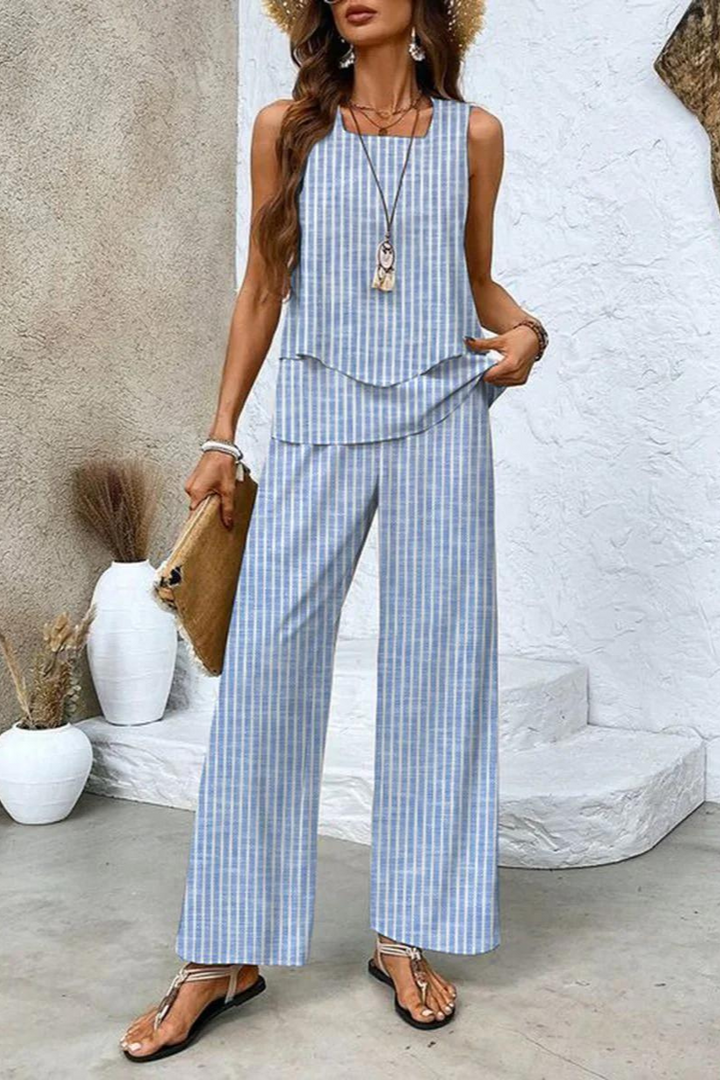 Women's vibrant floral matching set, including a stylish patterned top and elegant comfortable trousers.