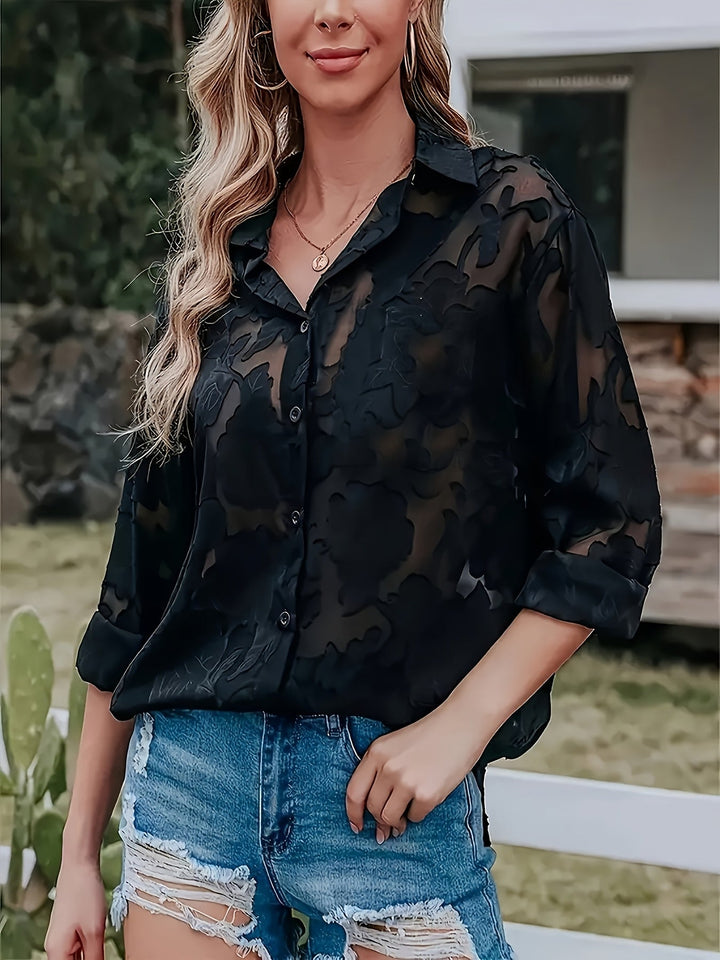Women's chic jacquard V-neck blouse, elegant and stylish for professional or evening wear.