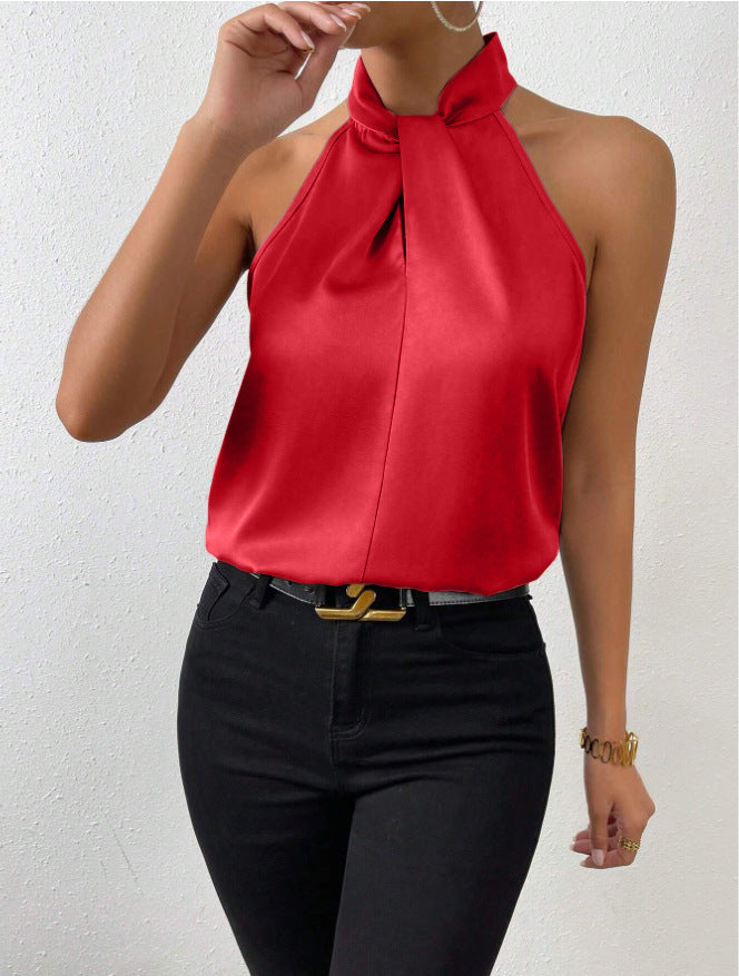 Versatile women's top, sleeveless knot neck halter, ideal for both casual and dressy looks.