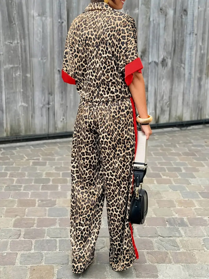 Elegant women's one-piece jumpsuit featuring a trendy leopard print and flattering V-neck.
