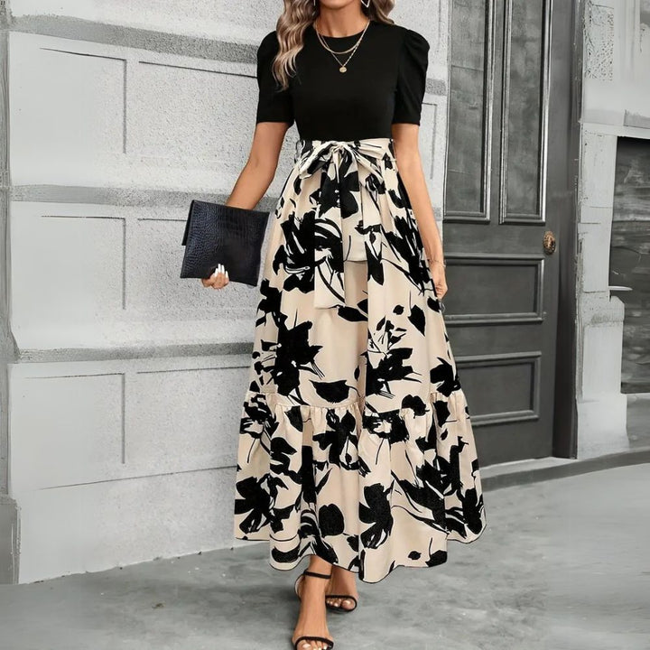Women's chic long maxi dress, elegant & comfortable, perfect for summer wear or a special occasion.