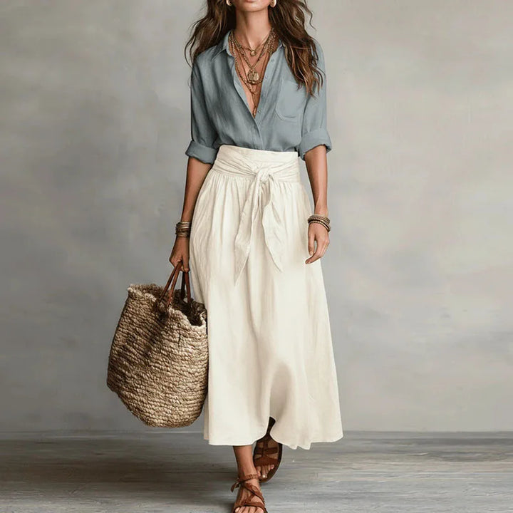 Women's chic long sleeve skirt co-ord set with a tie-waist skirt, perfect for versatile everyday and office wear.