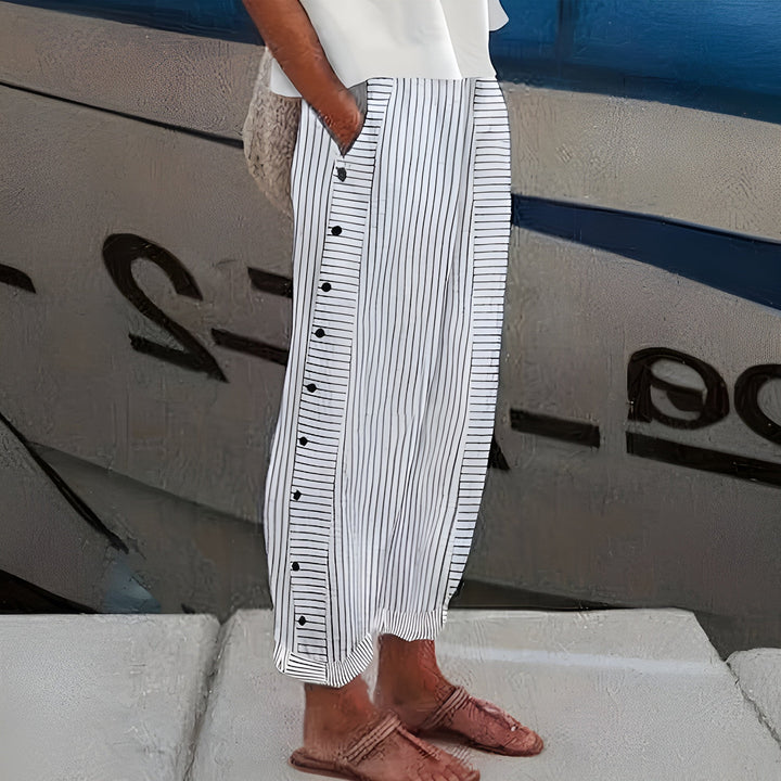Fashionable women's cropped trousers featuring a modern stripe panel, perfect for casual or professional workwear.
