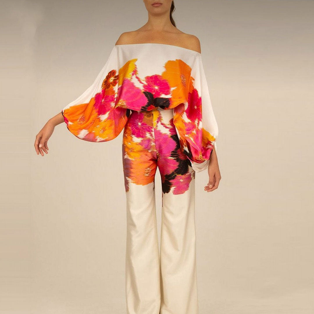 Comfortable women's off-shoulder two-piece summer outfit, featuring a relaxed fit and chic print.
