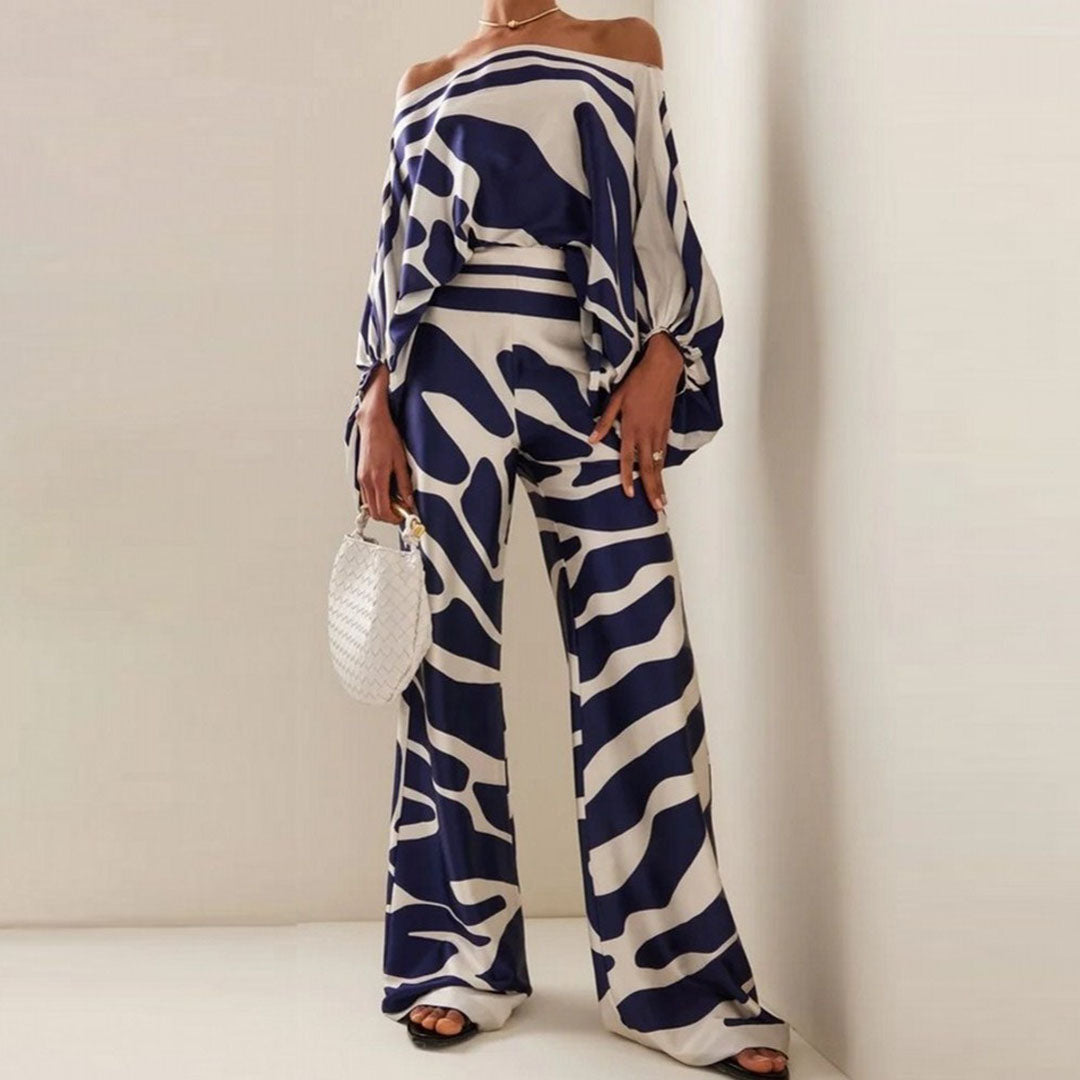 Stylish women's off-shoulder summer two-piece set, a perfect matching ensemble for your warm-weather wardrobe.
