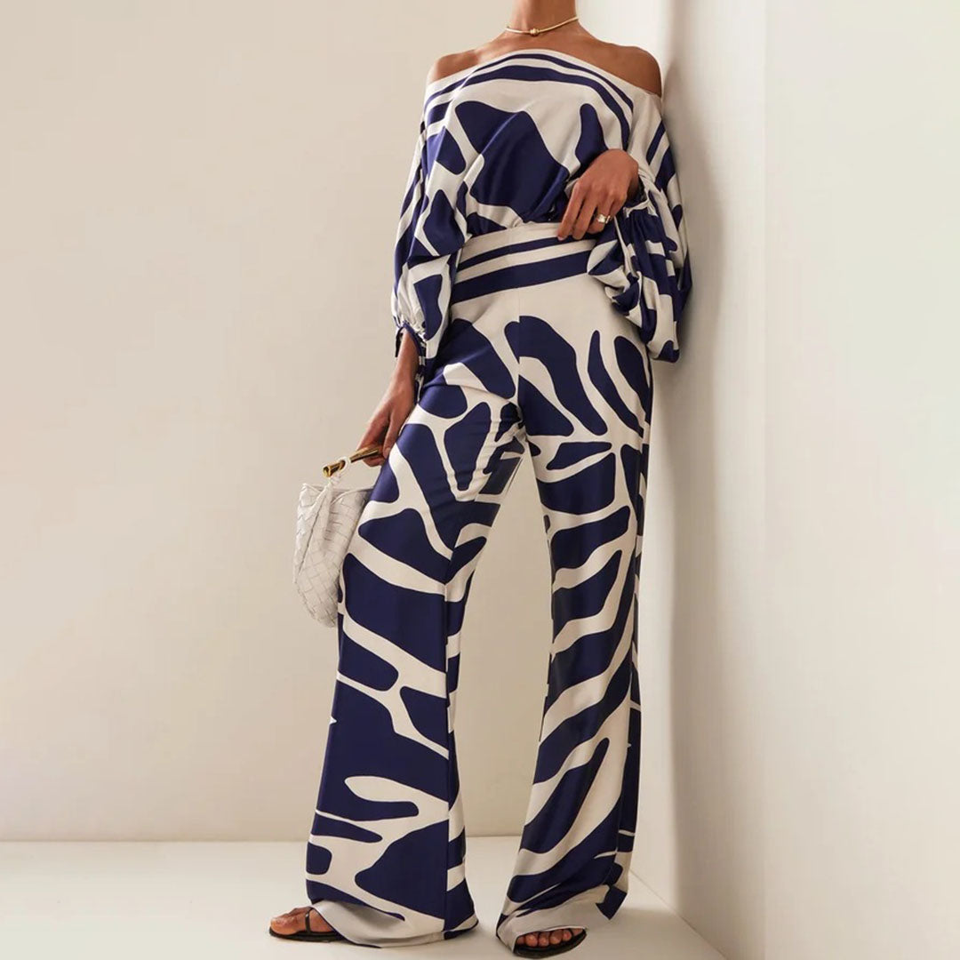 Back view of a women's off-shoulder summer two-piece set, showcasing the comfortable casual fit.