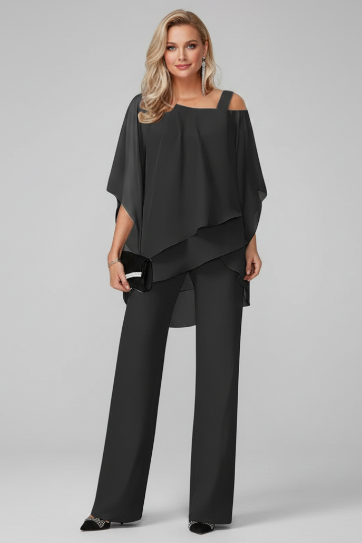 Elegant women's off-shoulder top and straight-leg pants coordinated set, perfect for spring fashion.