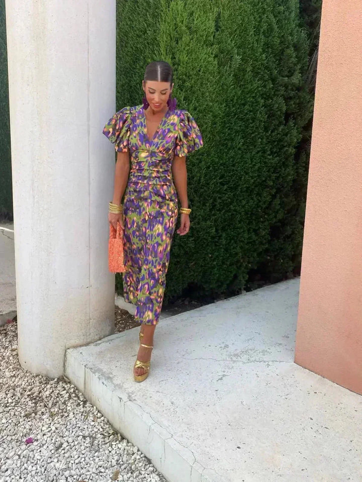 Elegant women's printed maxi dress with puff sleeves and v-neck, perfect as a formal wedding guest or evening gown.