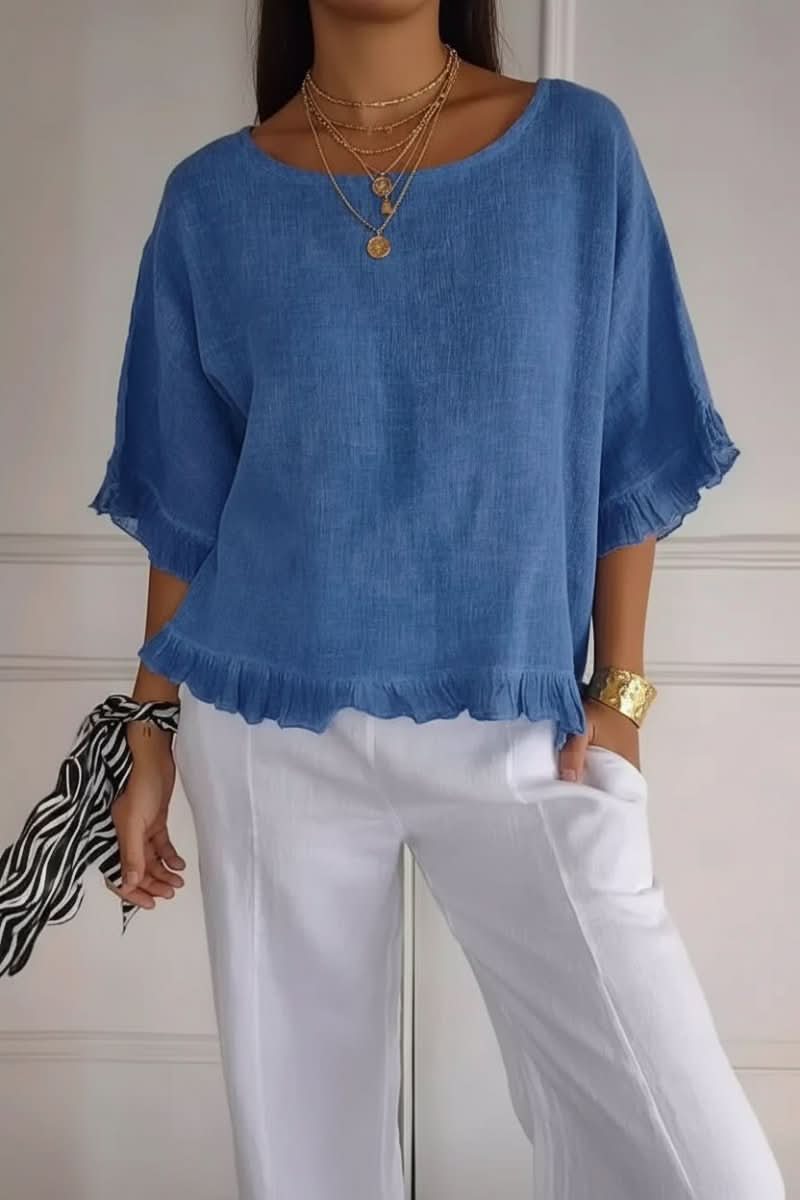 Women's chic ruffle blouse in a comfortable, versatile design. Perfect for everyday style.