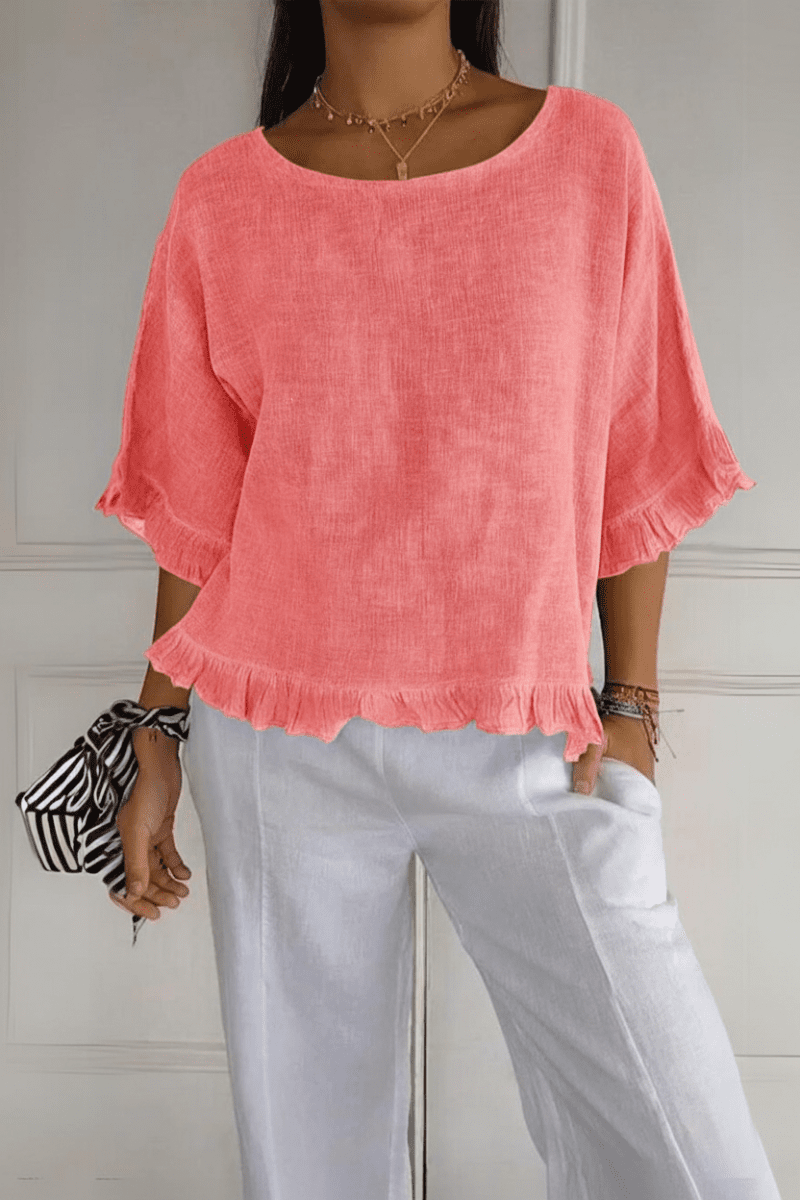 Feminine women's blouse with delicate ruffles. A chic and comfortable addition to any wardrobe.