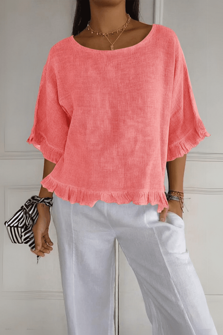 Feminine women's blouse with delicate ruffles. A chic and comfortable addition to any wardrobe.