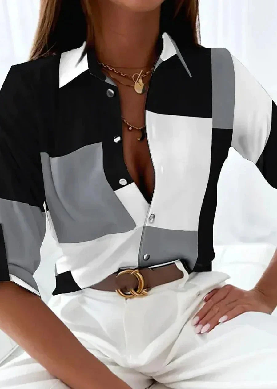 Elegant women's printed short sleeve top, featuring a unique abstract design, ideal for casual or workwear styles.