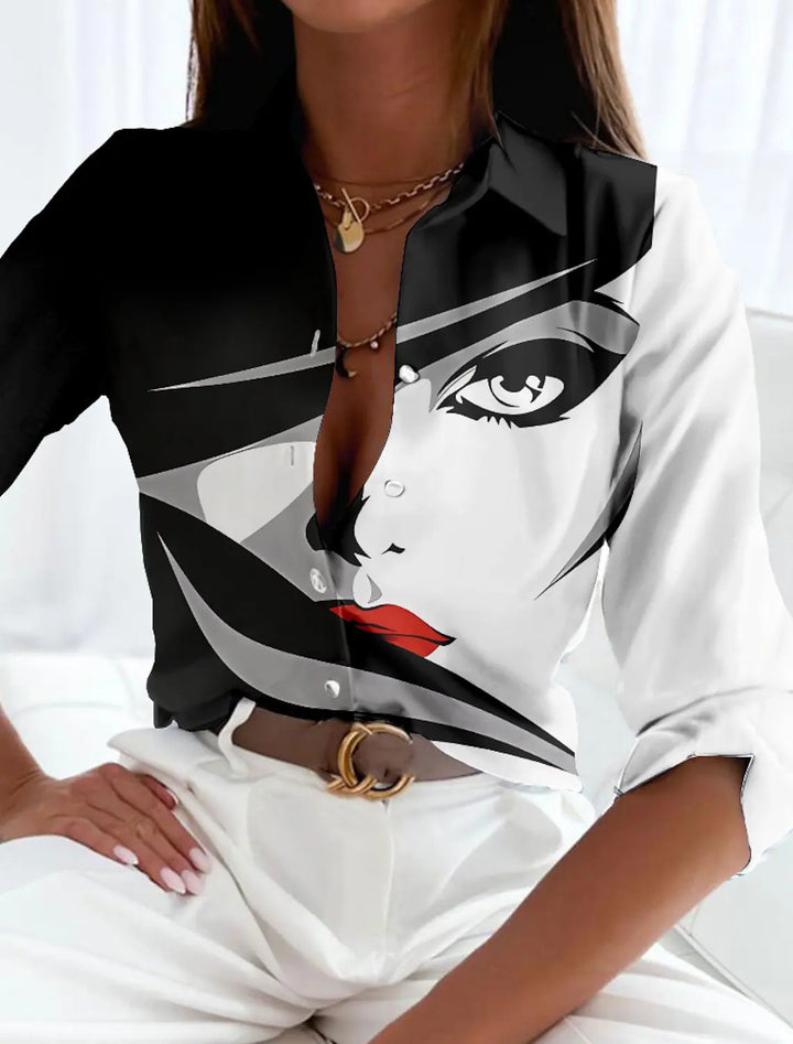 Fashionable women's blouse with a flattering short sleeve cut and a stylish abstract pattern, great for spring.