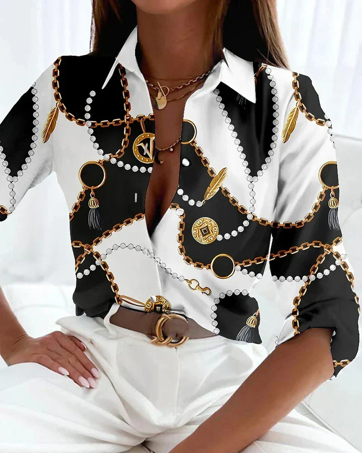 Versatile women's printed short sleeve top, offering an effortlessly chic look for everyday elegance.