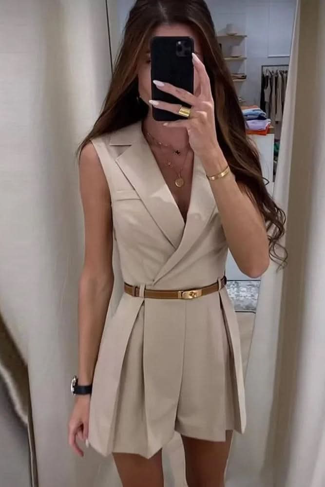 Apricot sleeveless belted romper, a chic and casual choice for summer vacations and resort wear.