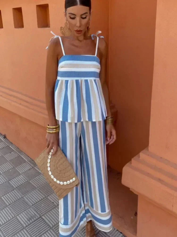 Women's chic striped two-piece outfit set with peplum top and elegant wide-leg trousers for summer events.