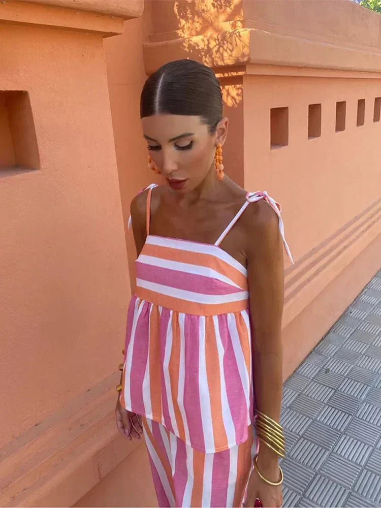 Stylish striped wide leg outfit for women, a comfortable and elegant choice for wedding guests & summer parties.