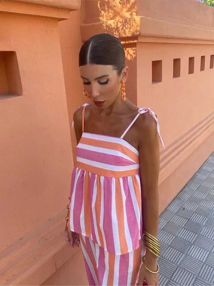 Stylish striped wide leg outfit for women, a comfortable and elegant choice for wedding guests & summer parties.