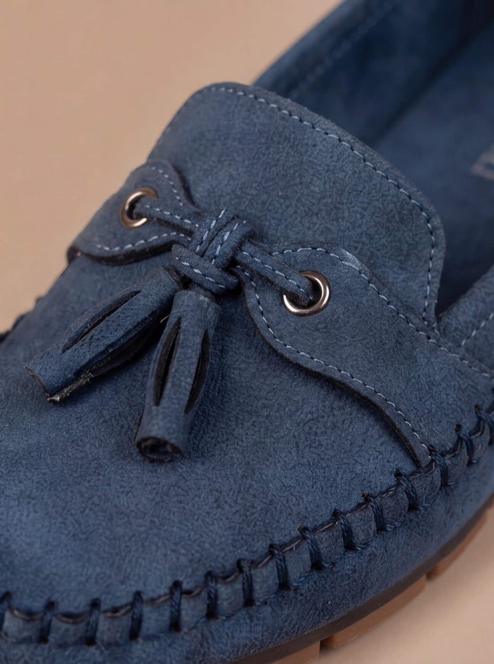 Elegant women's tassel moccasin loafers. Versatile casual flats for work to weekend style.